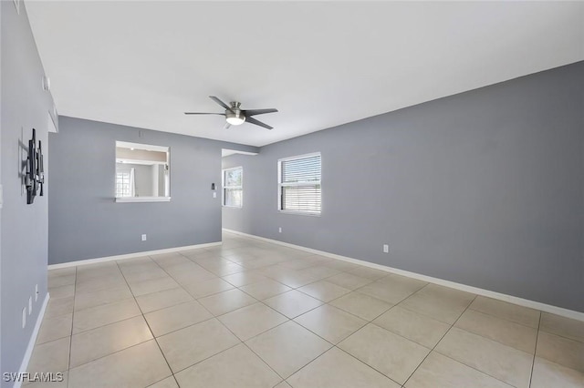 26672 Little John Ct Unit 85, Bonita Springs, FL 34135 - unfurnished room with ceiling fan, light tile patterned flooring, and baseboards