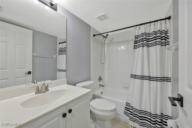26672 Little John Ct Unit 85, Bonita Springs, FL 34135 - bathroom with toilet, vanity, and shower / bath combo with shower curtain