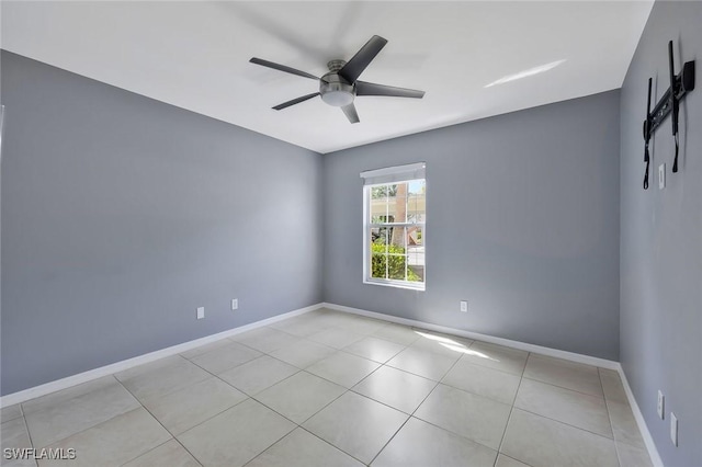 26672 Little John Ct Unit 85, Bonita Springs, FL 34135 - unfurnished room with ceiling fan, baseboards, and tile patterned flooring