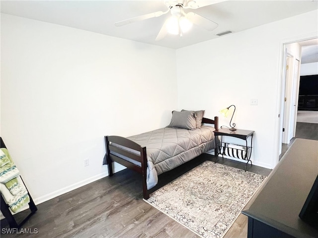 1511 SW 29th Ter, Cape Coral, FL 33914 - bedroom with wood finished floors and ceiling fan