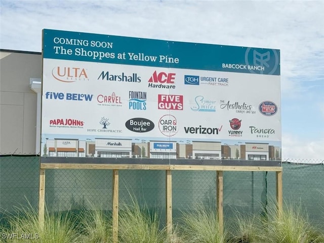 exterior details featuring fence