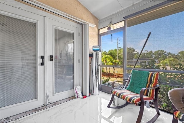 25068 Harborview Rd Unit 1B, Punta Gorda, FL 33980 - sunroom / solarium with lofted ceiling and marble finish floor