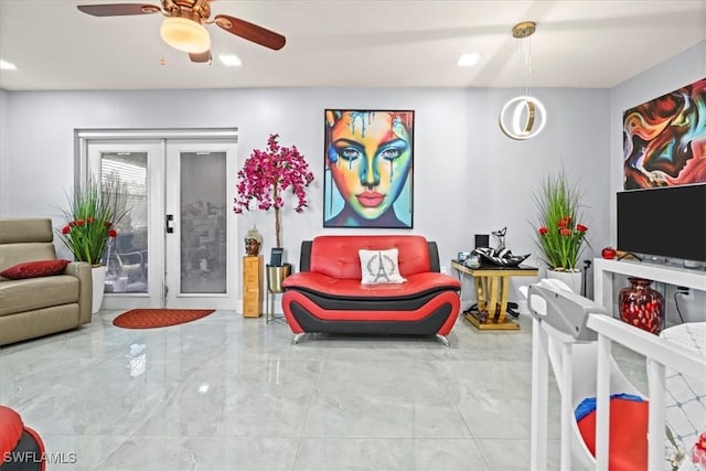 25068 Harborview Rd Unit 1B, Punta Gorda, FL 33980 - living area with marble finish floor and a ceiling fan