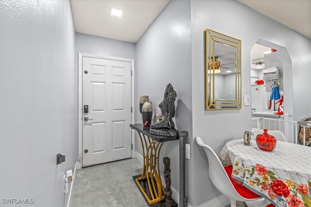 25068 Harborview Rd Unit 1B, Punta Gorda, FL 33980 - entryway with baseboards