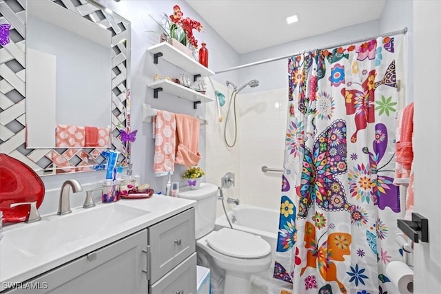 25068 Harborview Rd Unit 1B, Punta Gorda, FL 33980 - bathroom with shower / tub combo with curtain, toilet, and vanity