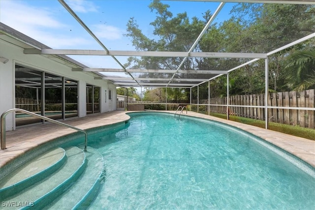 1147 Shady Rest Ln, Naples, FL 34103 - view of pool featuring a fenced backyard and glass enclosure