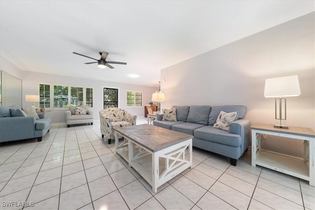1147 Shady Rest Ln, Naples, FL 34103 - living area featuring light tile patterned floors and ceiling fan