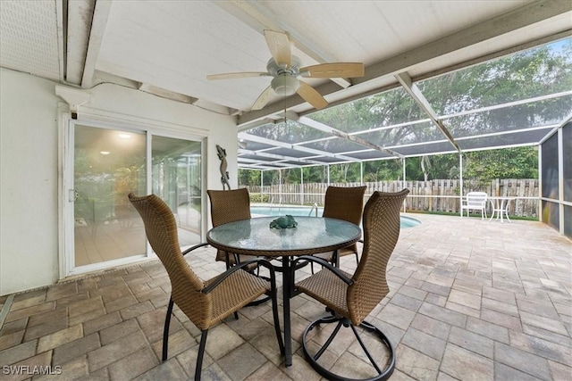 1147 Shady Rest Ln, Naples, FL 34103 - fenced backyard featuring a patio, a ceiling fan, a lanai, and outdoor dining area