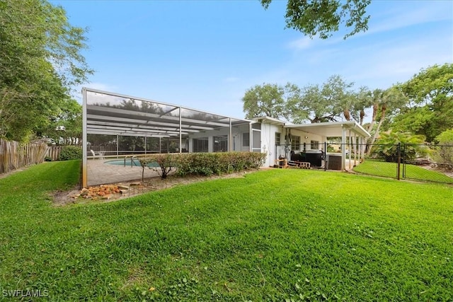 1147 Shady Rest Ln, Naples, FL 34103 - rear view of property featuring a fenced backyard, a gate, and a lanai