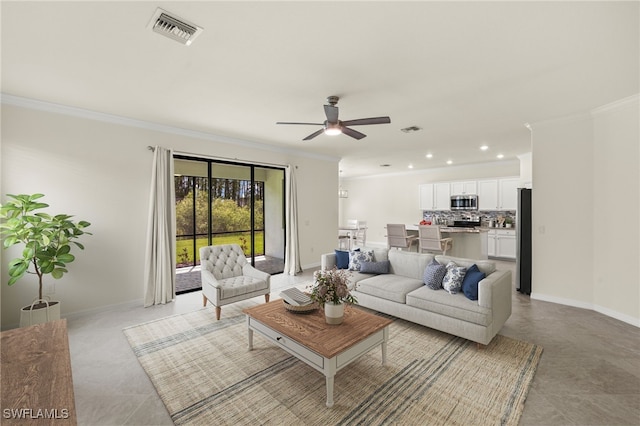 11555 Golden Oak Ter, Fort Myers, FL 33913 - living area featuring visible vents, baseboards, crown molding, and ceiling fan