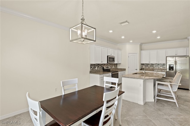 11555 Golden Oak Ter, Fort Myers, FL 33913 - dining space featuring visible vents, light tile patterned floors, an inviting chandelier, ornamental molding, and recessed lighting