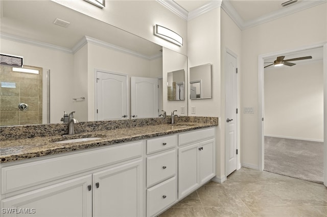 11555 Golden Oak Ter, Fort Myers, FL 33913 - full bath featuring double vanity, a tile shower, a sink, and ornamental molding