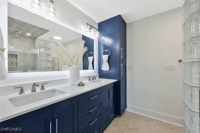 6325 Park Rd, Fort Myers, FL 33908 - full bathroom featuring double vanity, tile patterned floors, and baseboards