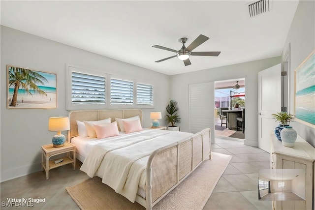 6325 Park Rd, Fort Myers, FL 33908 - bedroom with light tile patterned floors, ceiling fan, and baseboards