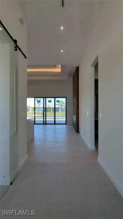 308 SW 13th Ct, Cape Coral, FL 33991 - corridor featuring concrete floors, baseboards, and recessed lighting