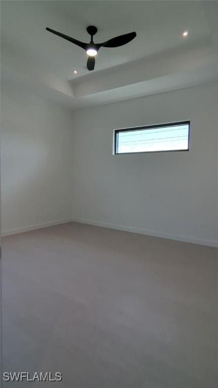 308 SW 13th Ct, Cape Coral, FL 33991 - empty room featuring recessed lighting, baseboards, and a raised ceiling