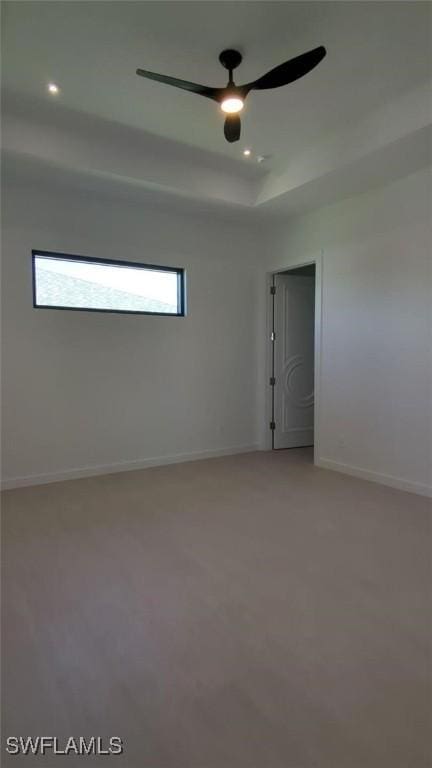 308 SW 13th Ct, Cape Coral, FL 33991 - unfurnished room with baseboards, light carpet, recessed lighting, a raised ceiling, and ceiling fan