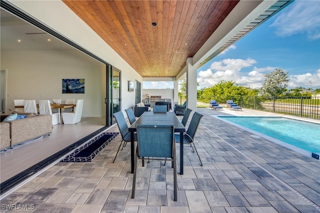308 SW 13th Ct, Cape Coral, FL 33991 - view of patio with outdoor dining area and an outdoor living space