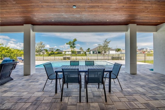308 SW 13th Ct, Cape Coral, FL 33991 - fenced backyard featuring a patio area and outdoor dining area