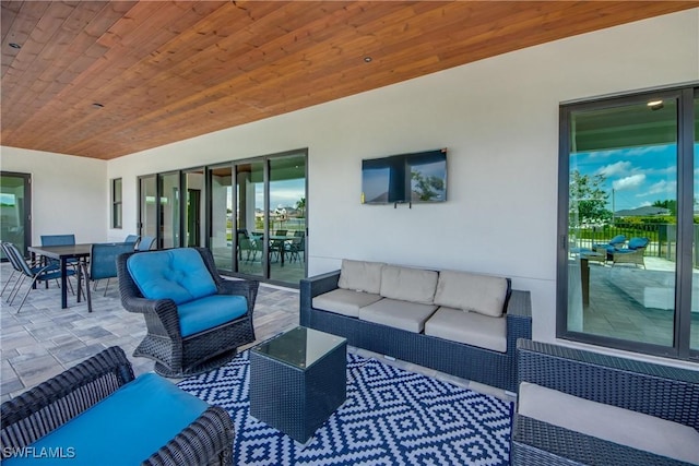 308 SW 13th Ct, Cape Coral, FL 33991 - view of patio with an outdoor hangout area and outdoor dining area
