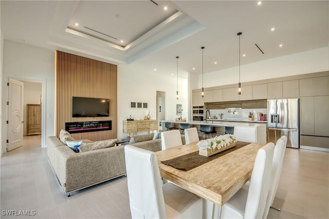 308 SW 13th Ct, Cape Coral, FL 33991 - dining room featuring a towering ceiling and recessed lighting