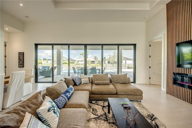 308 SW 13th Ct, Cape Coral, FL 33991 - living room with plenty of natural light, a towering ceiling, and recessed lighting
