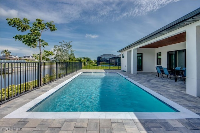 308 SW 13th Ct, Cape Coral, FL 33991 - view of swimming pool featuring a patio and a water view