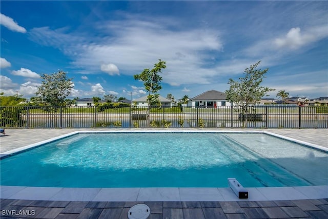 308 SW 13th Ct, Cape Coral, FL 33991 - view of pool with a water view, a patio area, and a residential view