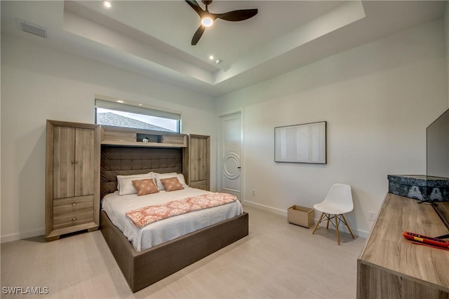 308 SW 13th Ct, Cape Coral, FL 33991 - bedroom featuring a raised ceiling, recessed lighting, and a ceiling fan