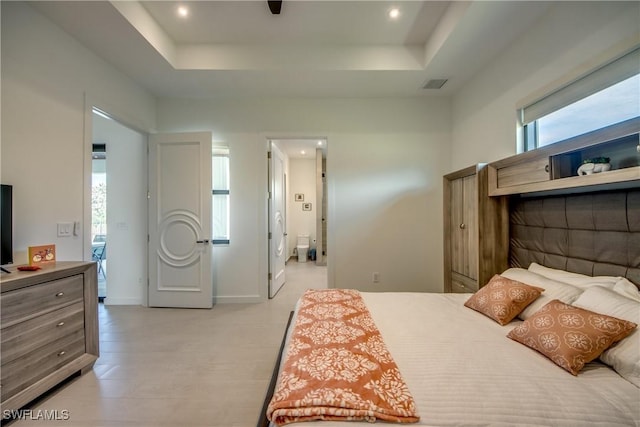 308 SW 13th Ct, Cape Coral, FL 33991 - bedroom with a tray ceiling and recessed lighting