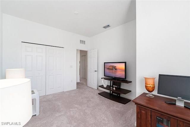 2926 Citrus St, Naples, FL 34120 - bedroom with light carpet and a closet