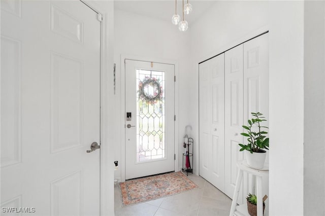 2926 Citrus St, Naples, FL 34120 - entrance foyer featuring light tile patterned floors