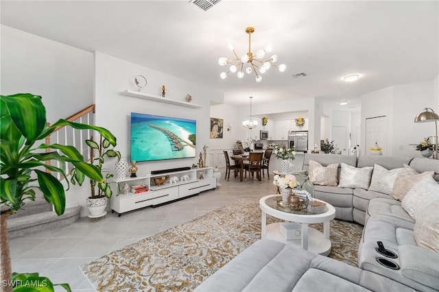 2926 Citrus St, Naples, FL 34120 - living area with a chandelier and light tile patterned floors