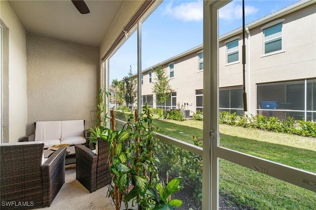 2926 Citrus St, Naples, FL 34120 - sunroom / solarium with ceiling fan, an outdoor living space, and a residential view