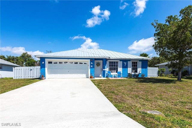 513 SE 27th Ter, Cape Coral, FL 33904 - single story home with an attached garage, metal roof, fence, concrete driveway, and a front lawn