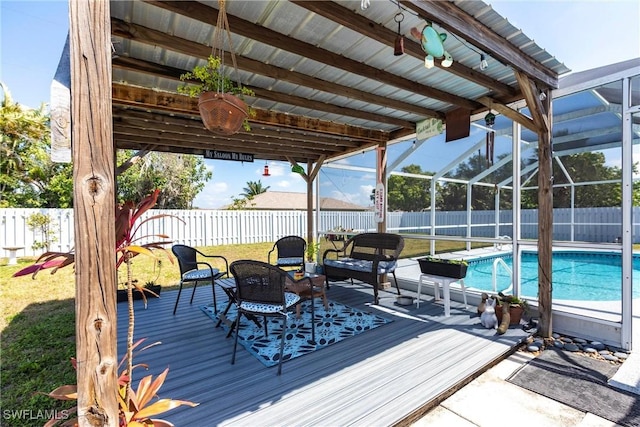 513 SE 27th Ter, Cape Coral, FL 33904 - deck with a fenced in pool, a fenced backyard, and a lanai