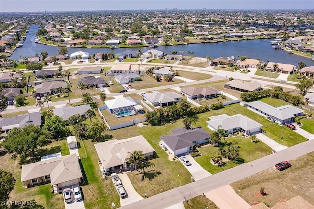 513 SE 27th Ter, Cape Coral, FL 33904 - drone / aerial view featuring a water view and a residential view