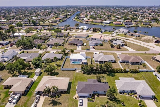 513 SE 27th Ter, Cape Coral, FL 33904 - aerial view featuring a water view and a residential view