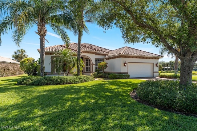 10326 Wishing Stone Ct, Bonita Springs, FL 34135 - mediterranean / spanish home featuring a tiled roof, a front yard, an attached garage, and stucco siding