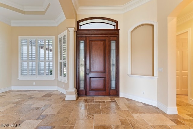 10326 Wishing Stone Ct, Bonita Springs, FL 34135 - foyer entrance featuring ornamental molding, stone tile flooring, baseboards, and ornate columns