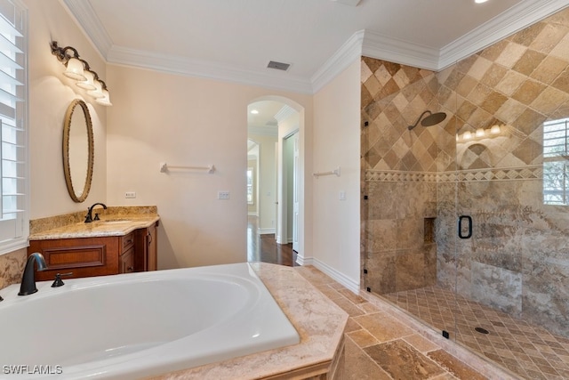 10326 Wishing Stone Ct, Bonita Springs, FL 34135 - bathroom featuring crown molding, visible vents, a stall shower, and stone tile flooring