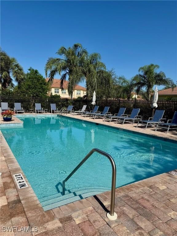 10326 Wishing Stone Ct, Bonita Springs, FL 34135 - pool with fence and a patio