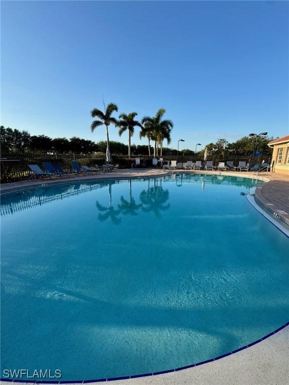 10326 Wishing Stone Ct, Bonita Springs, FL 34135 - pool featuring fence