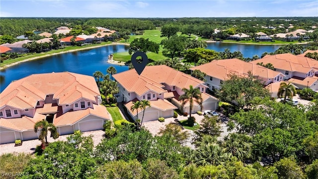 aerial view featuring a residential view and a water view