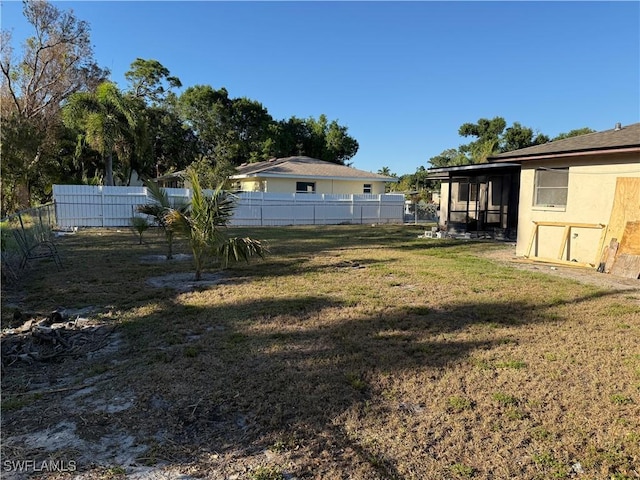 338 Melody Ct, Fort Myers, FL 33916 - view of yard featuring a sunroom