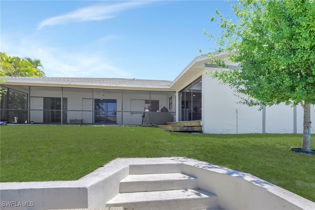 2226 SE 19th Pl, Cape Coral, FL 33990 - back of house with a sunroom and a yard