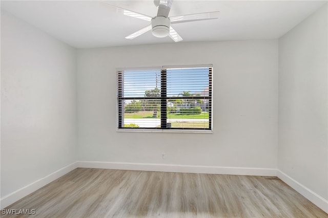 2226 SE 19th Pl, Cape Coral, FL 33990 - empty room featuring light wood finished floors, baseboards, and a ceiling fan