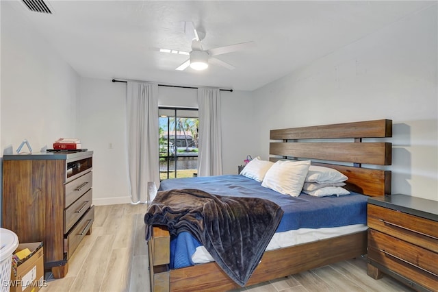2226 SE 19th Pl, Cape Coral, FL 33990 - bedroom with access to outside, ceiling fan, light wood-type flooring, and visible vents