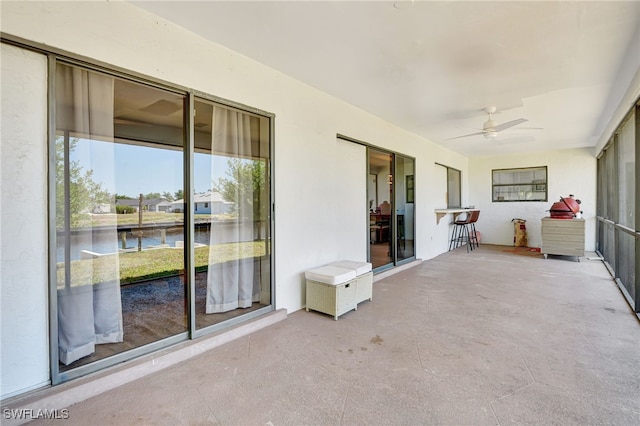 2226 SE 19th Pl, Cape Coral, FL 33990 - sunroom / solarium featuring a water view and ceiling fan