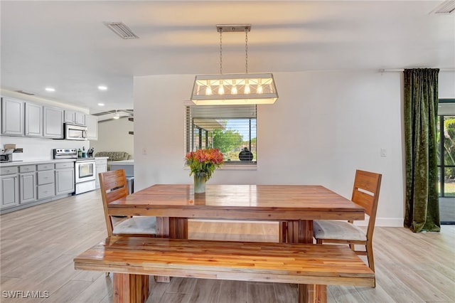 2226 SE 19th Pl, Cape Coral, FL 33990 - dining space featuring light wood finished floors, visible vents, and recessed lighting